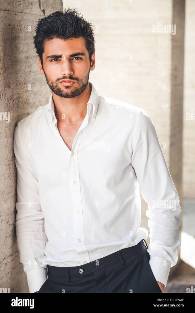 air-and-beard-leaning-with-a-side-on-a-wall-R2B9AF.jpg