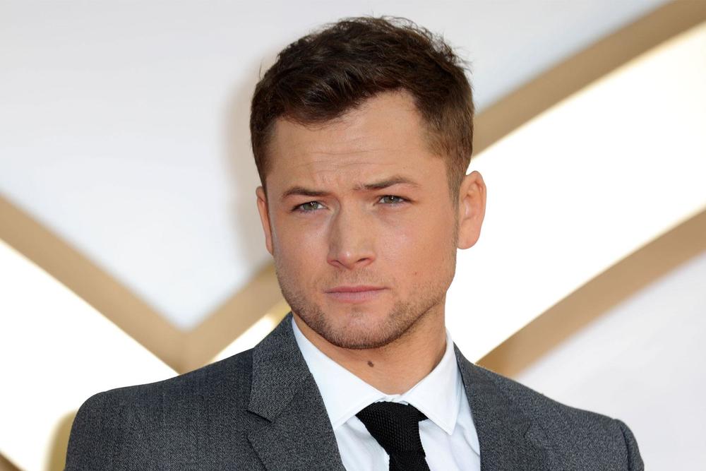 wenn_taronegerton_092517_1800x1200-1800x1200.jpg