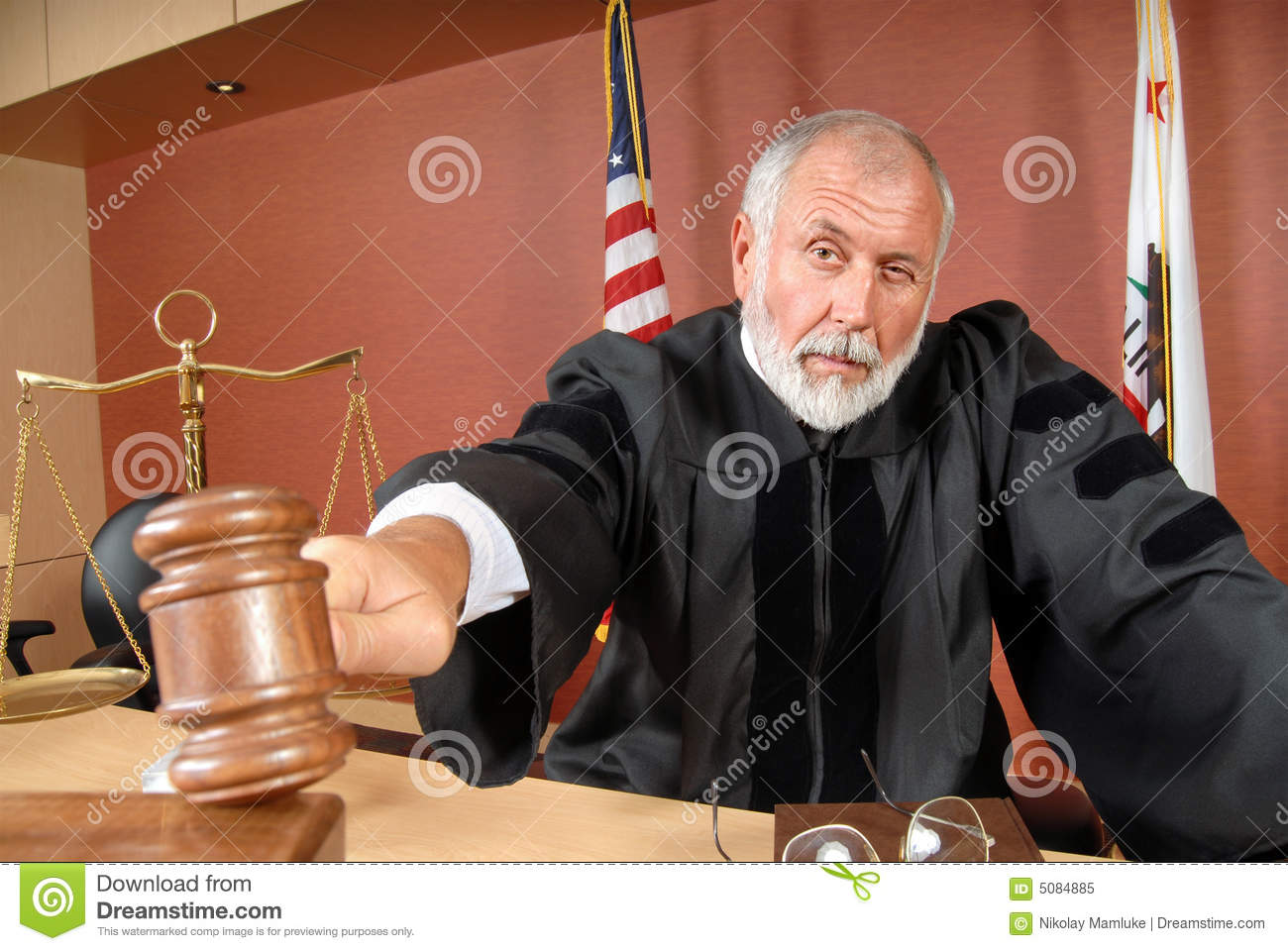 judge-using-his-gavel-5084885.jpg