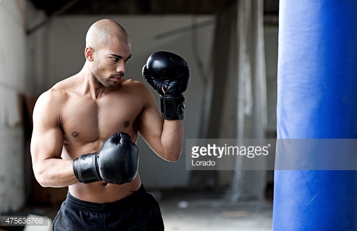 475636768-bald-black-athletic-man-boxing-in-an-gettyimages.jpg